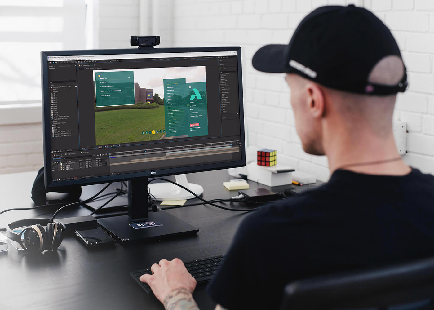 Editor at a desk working on video production for Augusta Technical College