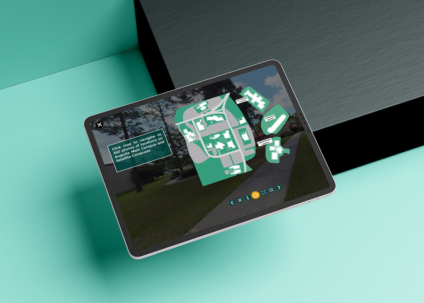 Tablet displaying a screen capture of interactive display of the Augusta Technical College virtual campus tour.