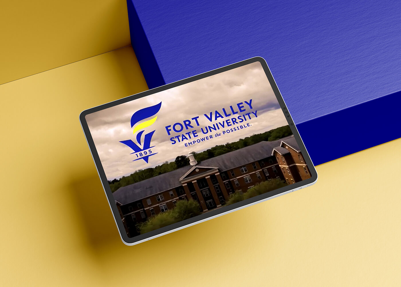 Tablet displaying drone footage of the Fort Valley State University campus